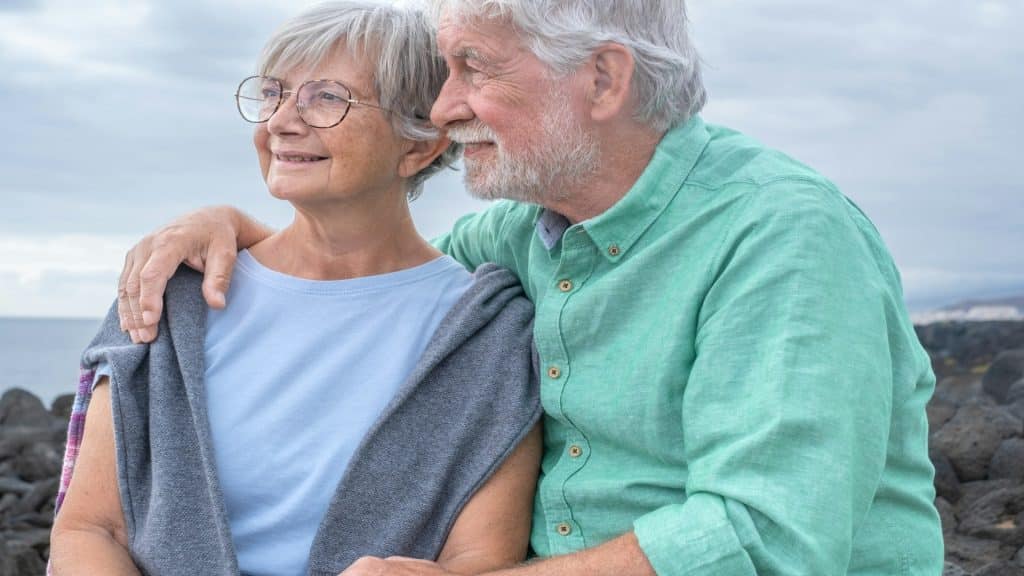 couple sitting together having thoughtful conversation