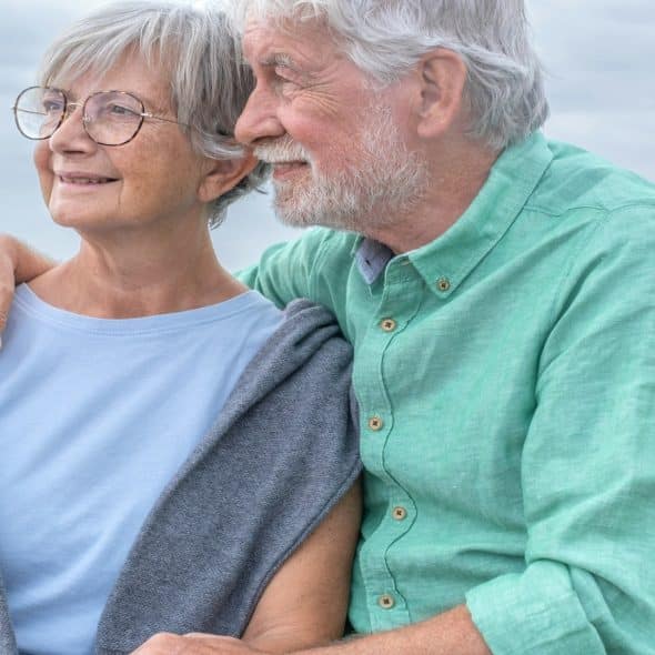 couple sitting together having thoughtful conversation
