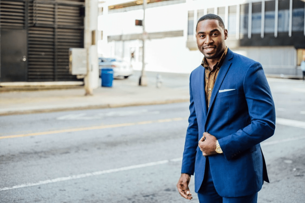 Confident man walking down the street
