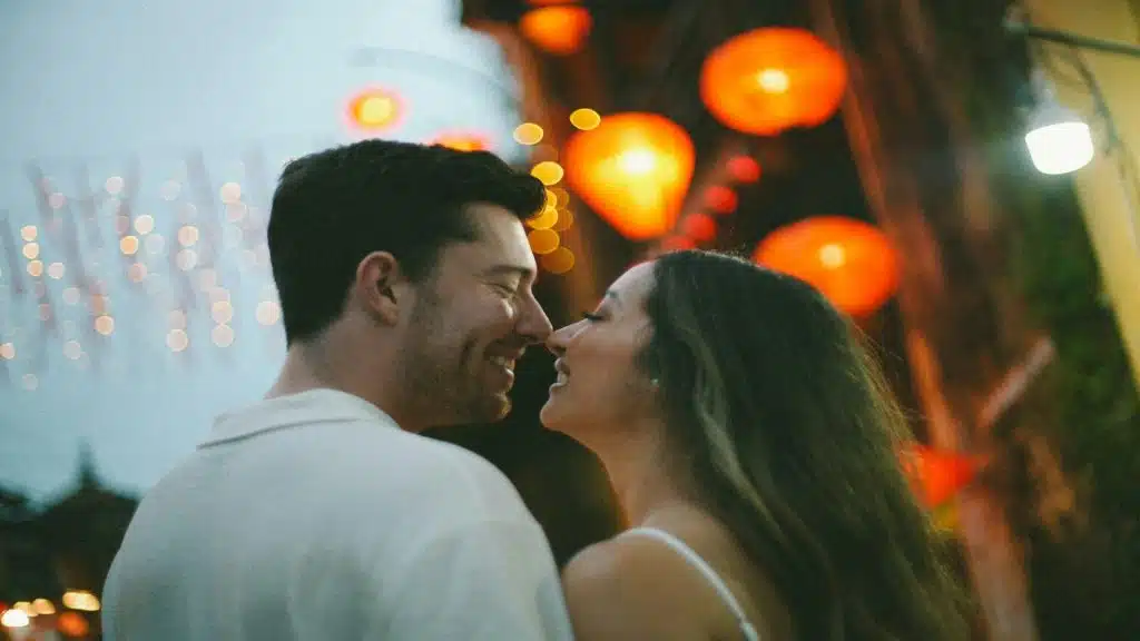 man laughing with partner