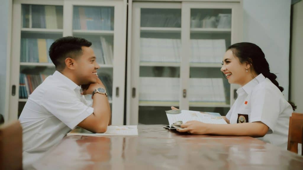 couple smiling during conversation