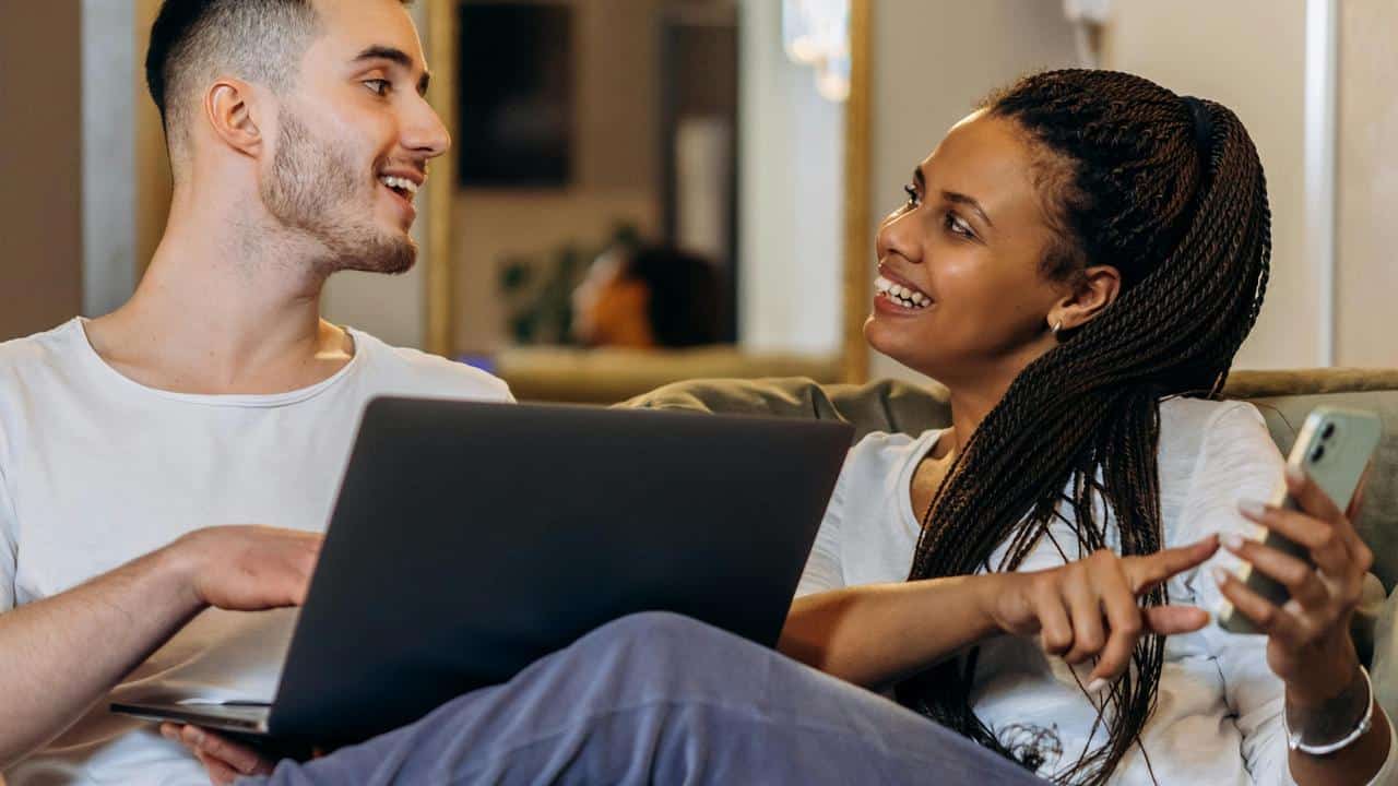 A couple sitting on a couch