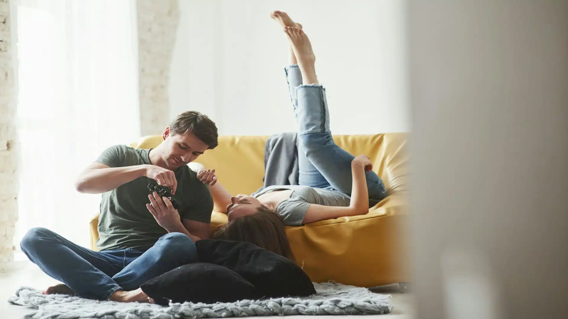 man relaxing while talking with partner