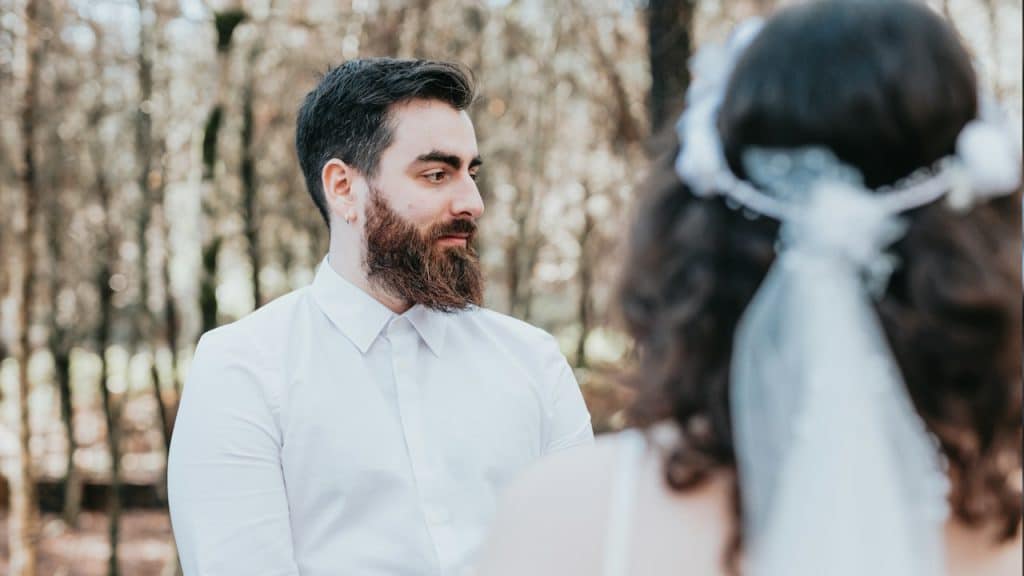A couple standing close to each other.