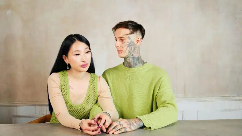 A man looking at the woman