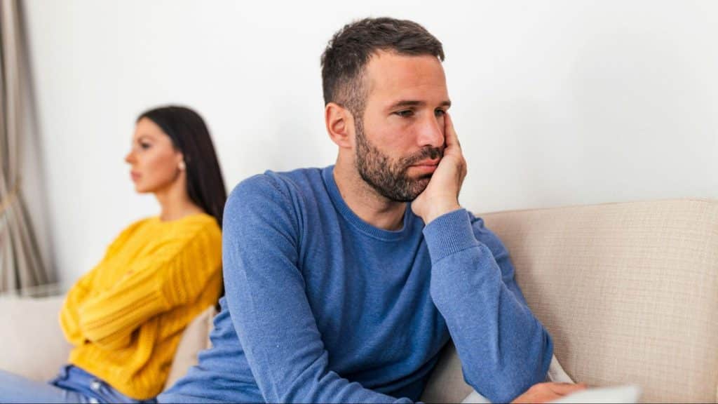 A man and woman numb with each other