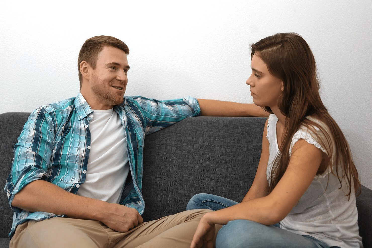 A man and woman talking