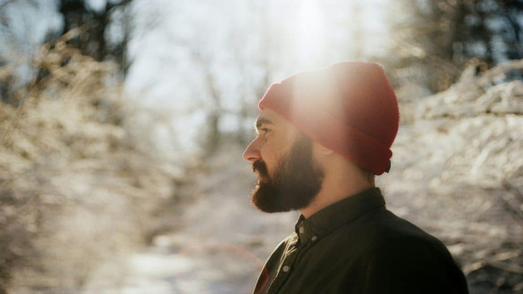 man reflecting outdoors