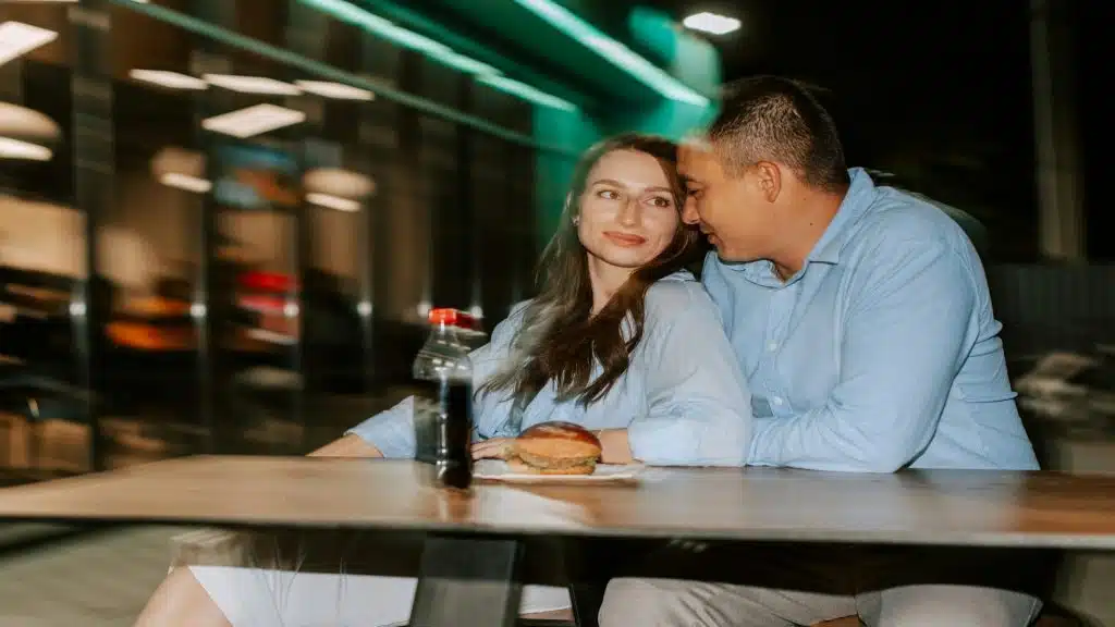 couple on an early date looking very engaged