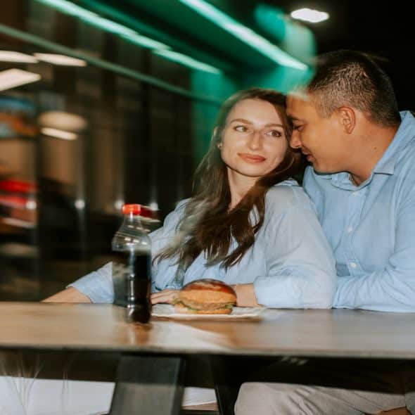 couple on an early date looking very engaged
