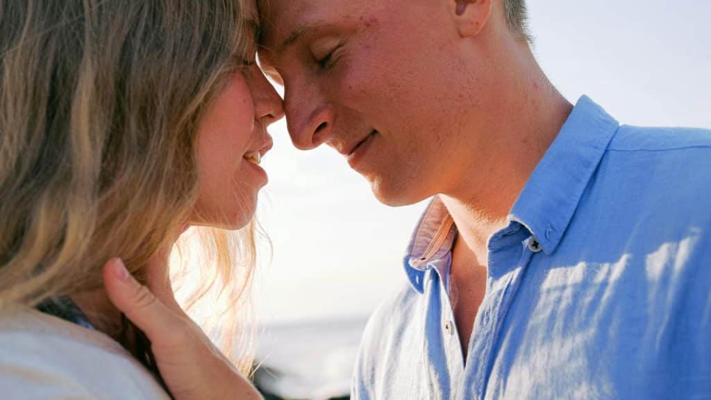 A couple touching foreheads