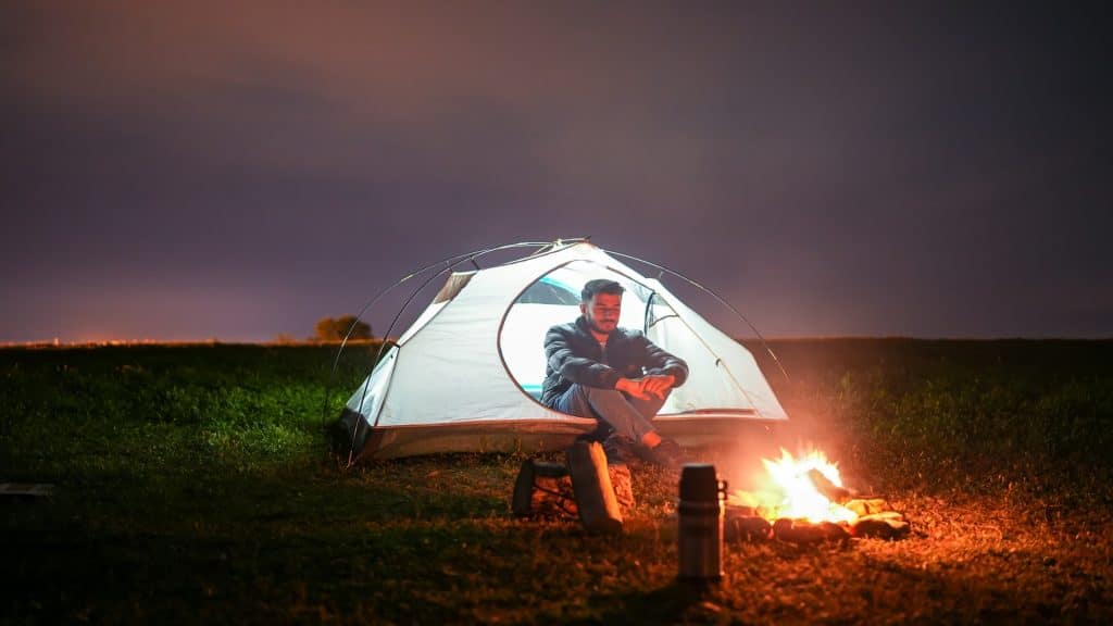 man sitting alone at night