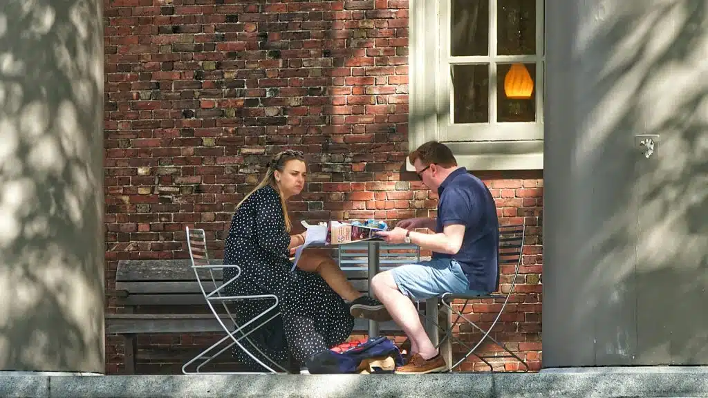 couple sitting seriously at table