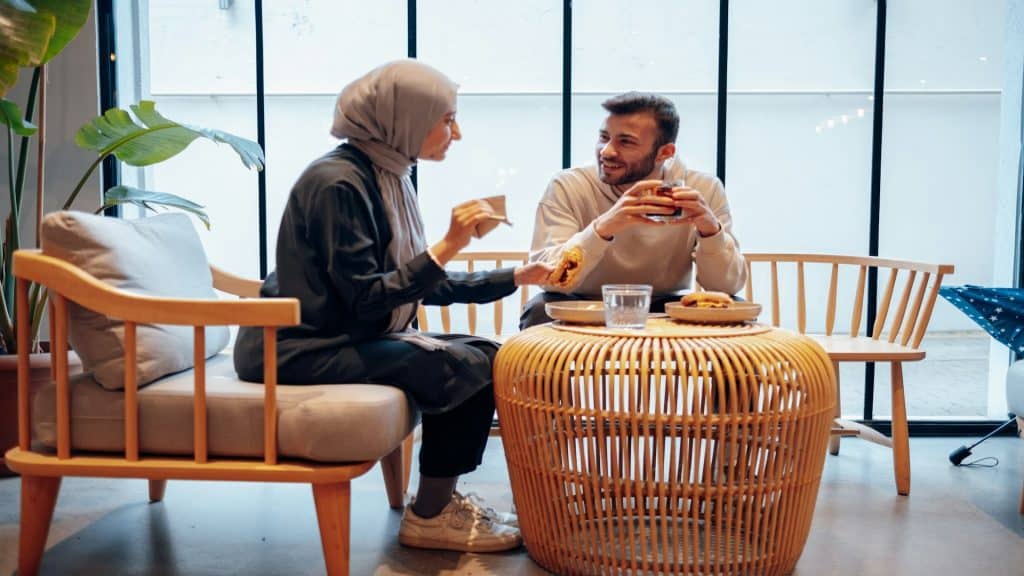 couple having open conversation indoors