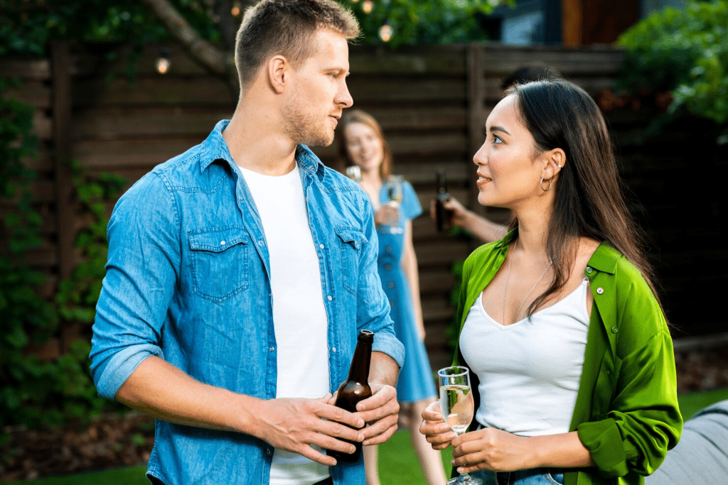 A man and woman looking at each other