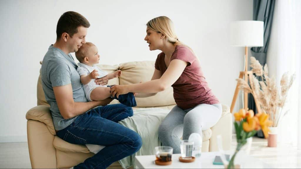 A man and woman with their child