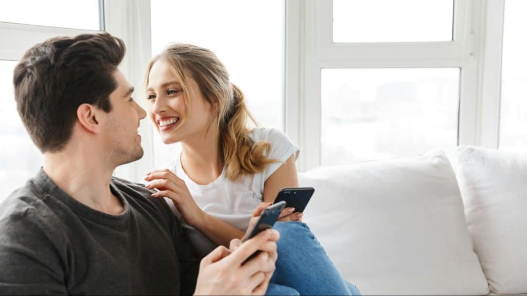 A man and woman looking at each other
