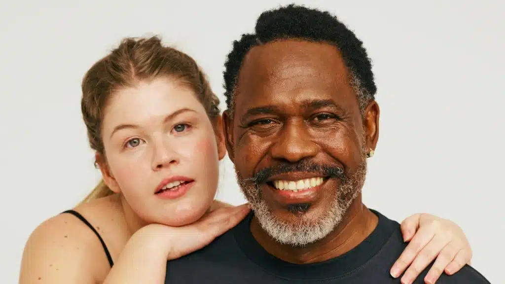 A man and a woman posing for a picture.