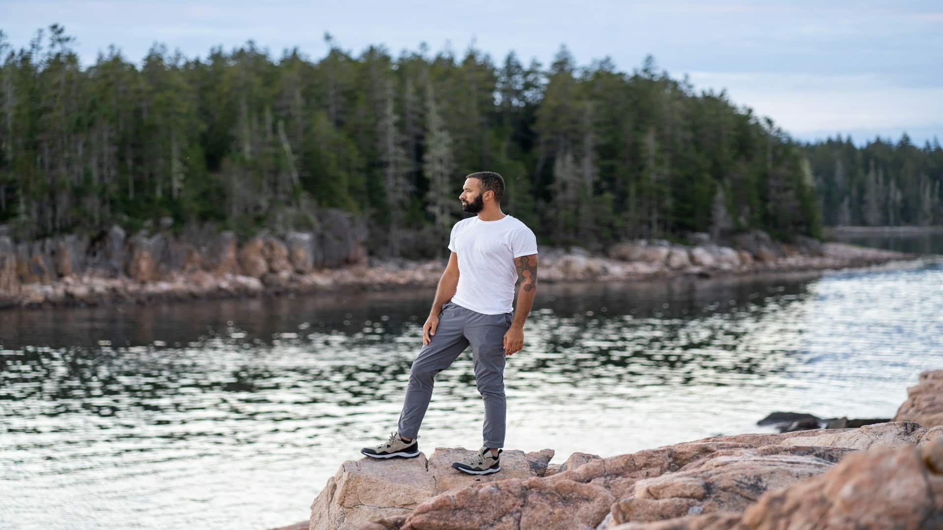 man standing thoughtfully outdoors
