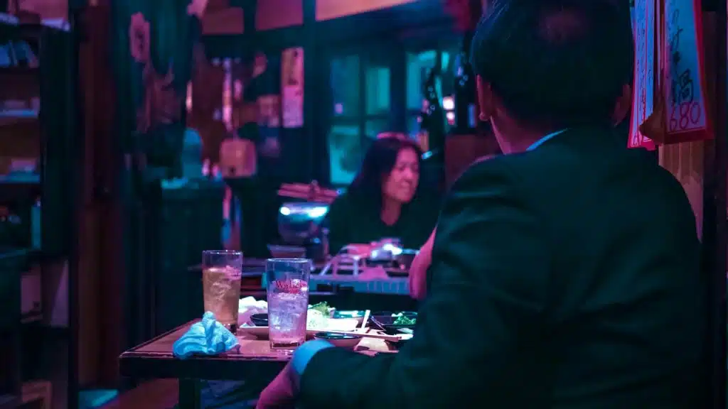 A man sitting at a restaurant.