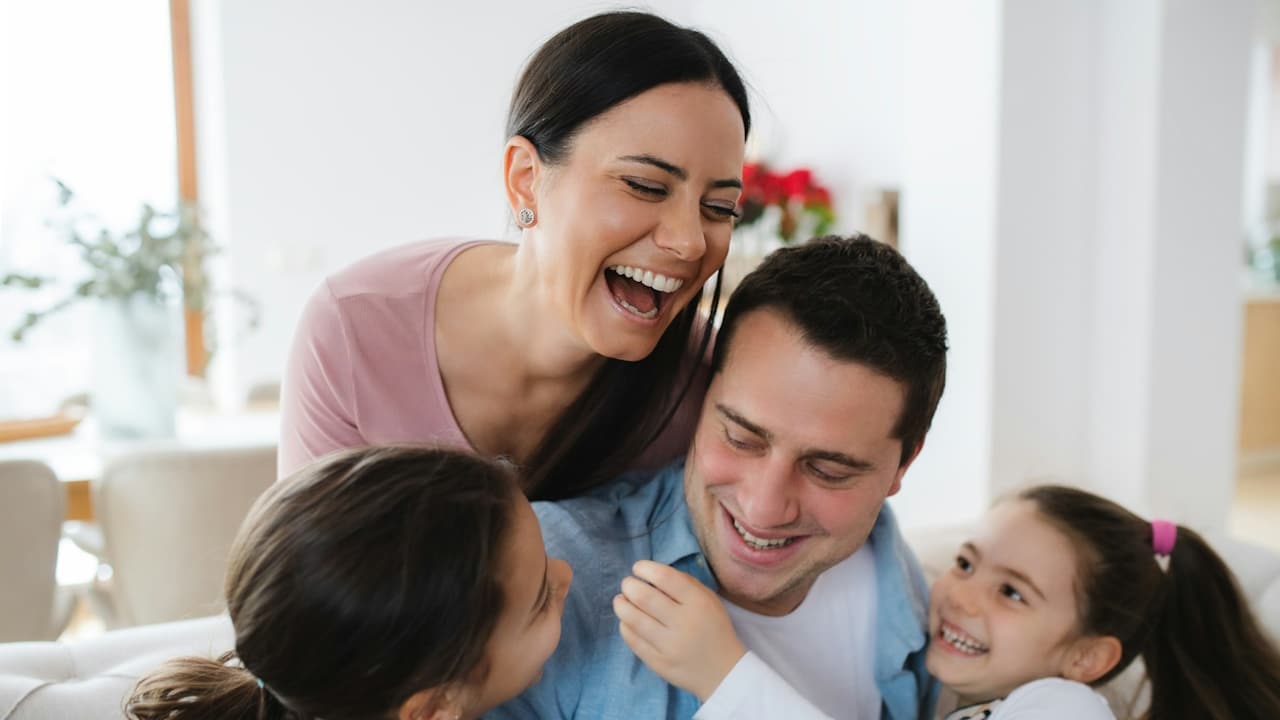 A family laughing together.