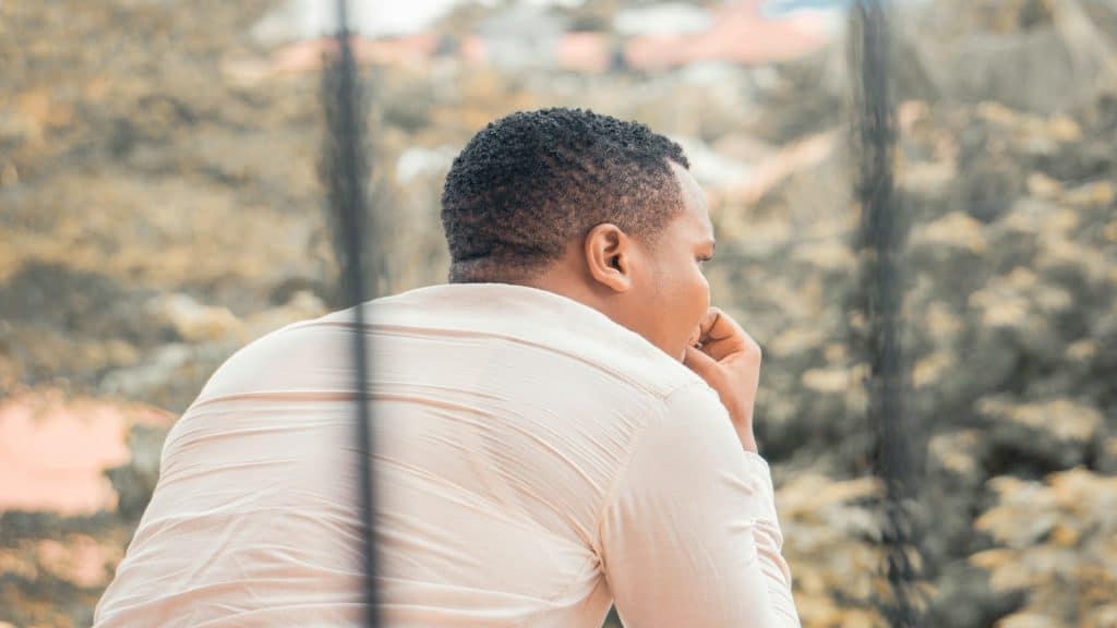 man reflecting during quiet moment