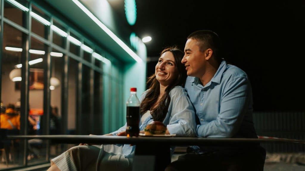 A man and a woman are having a romantic date.