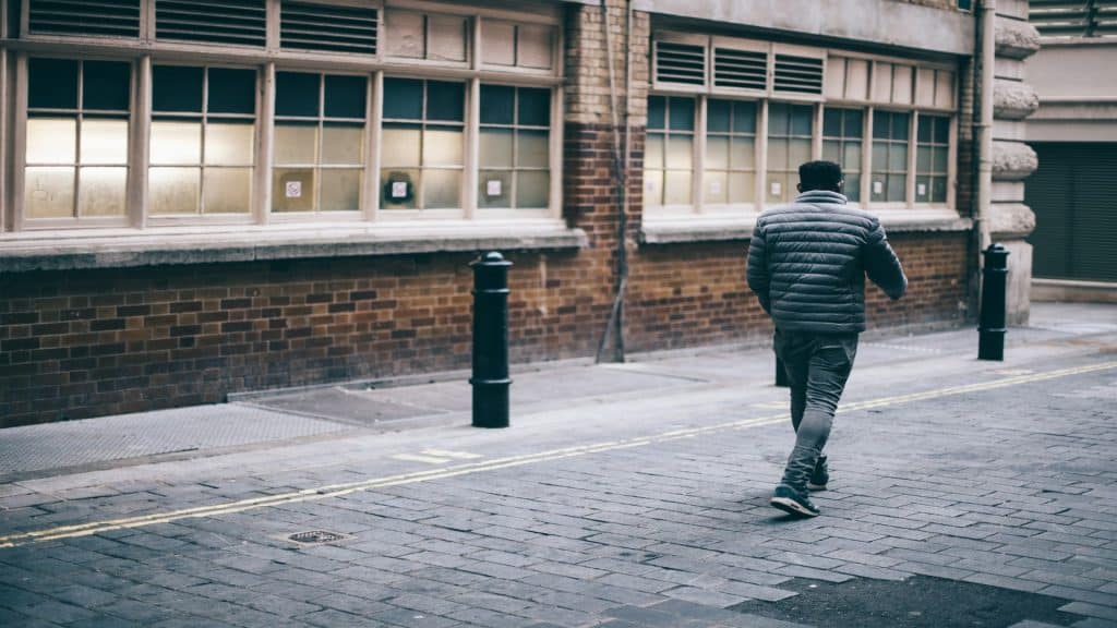 man walking away calmly