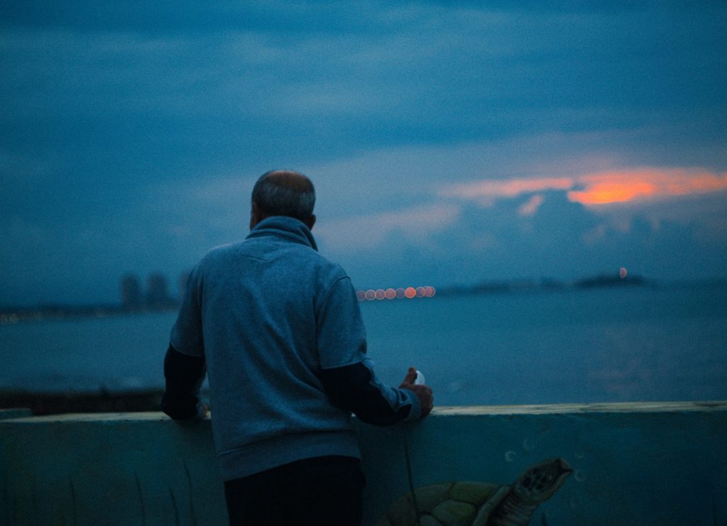 man looking city skyline