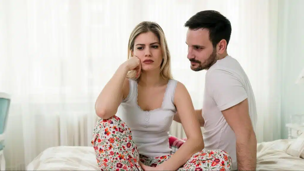 A man trying to speak with woman 