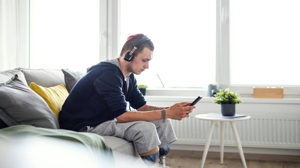 man listening attentively indoors