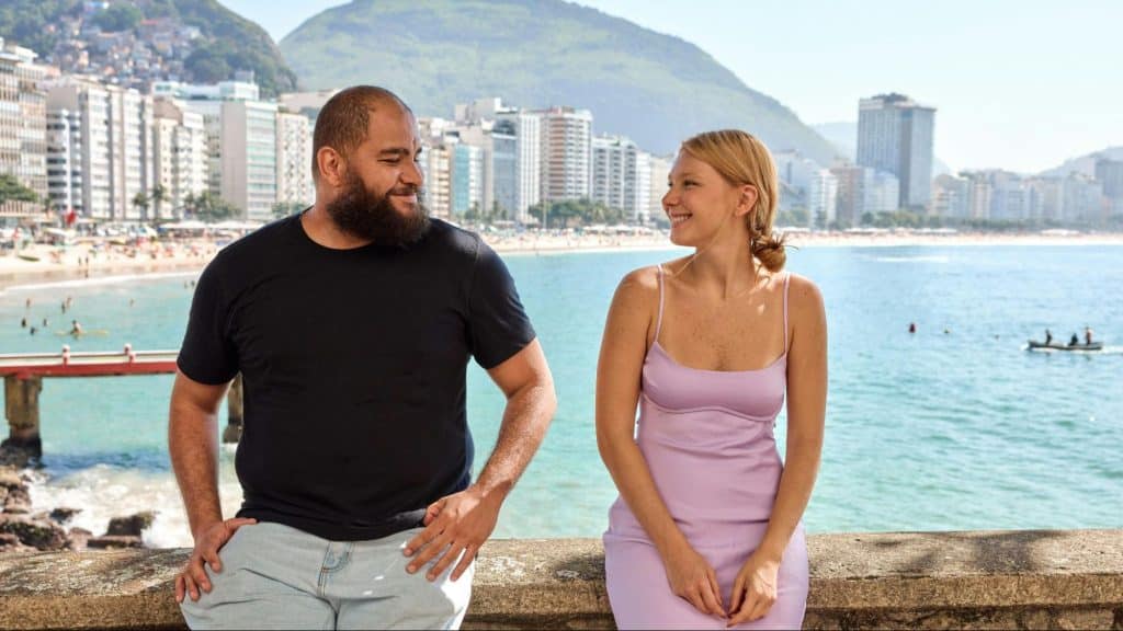 A man and woman looking at each other