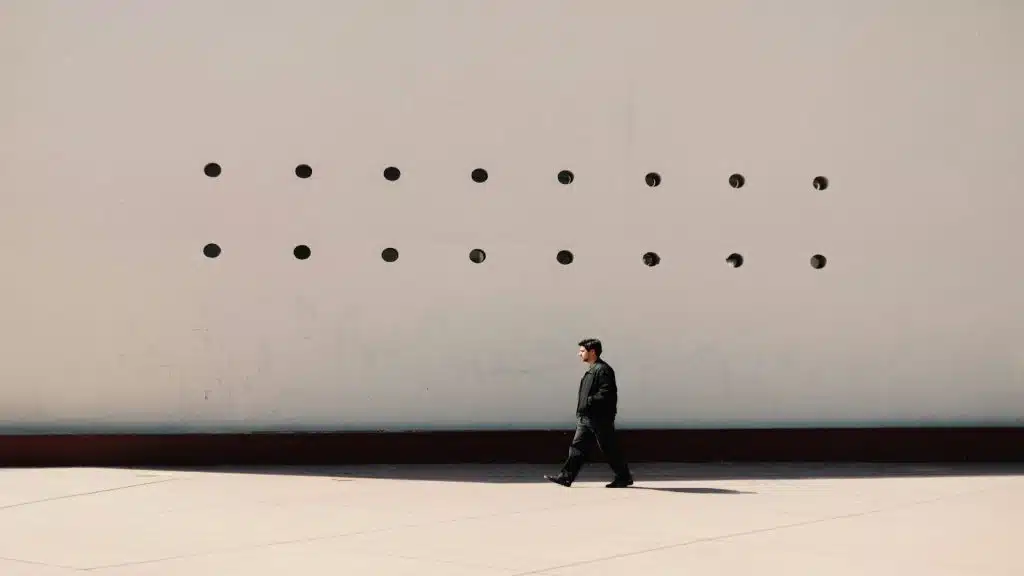 man walking alone outdoors