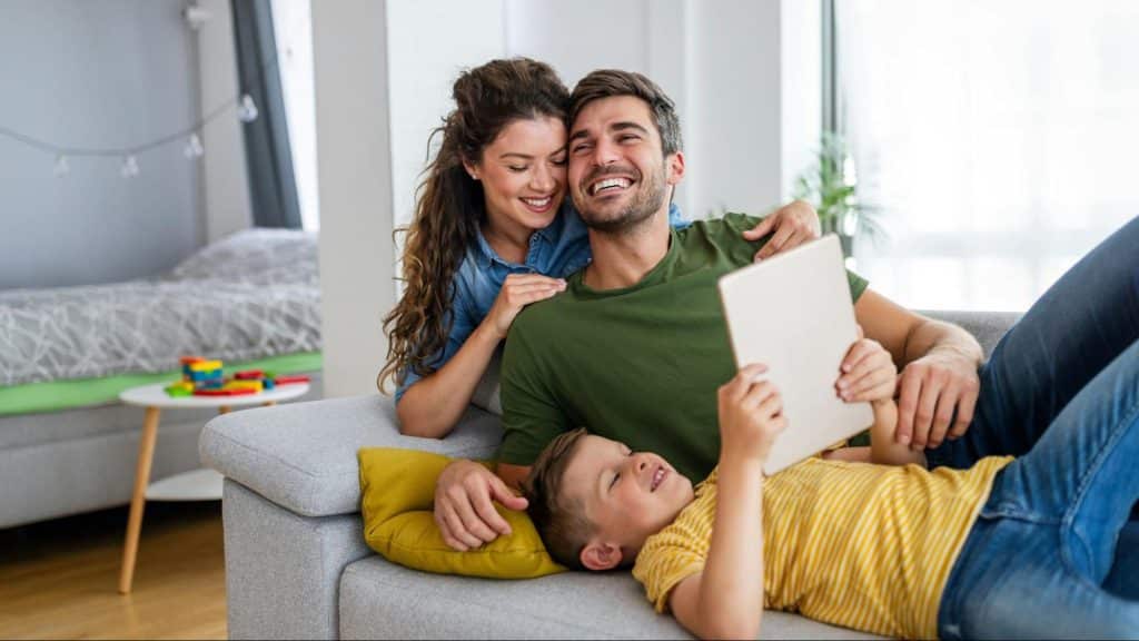 A man and woman together with their child