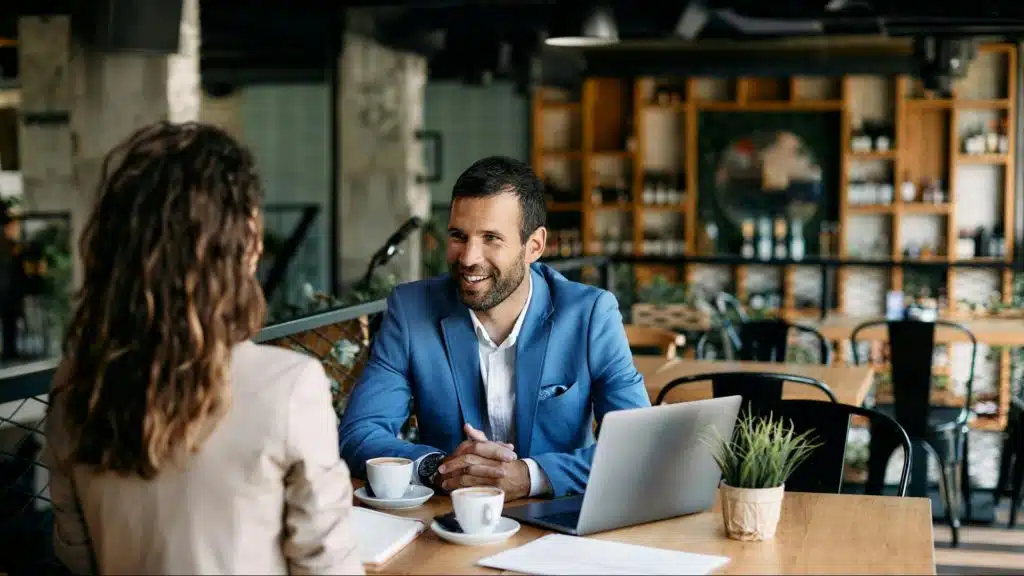 A man and woman talking