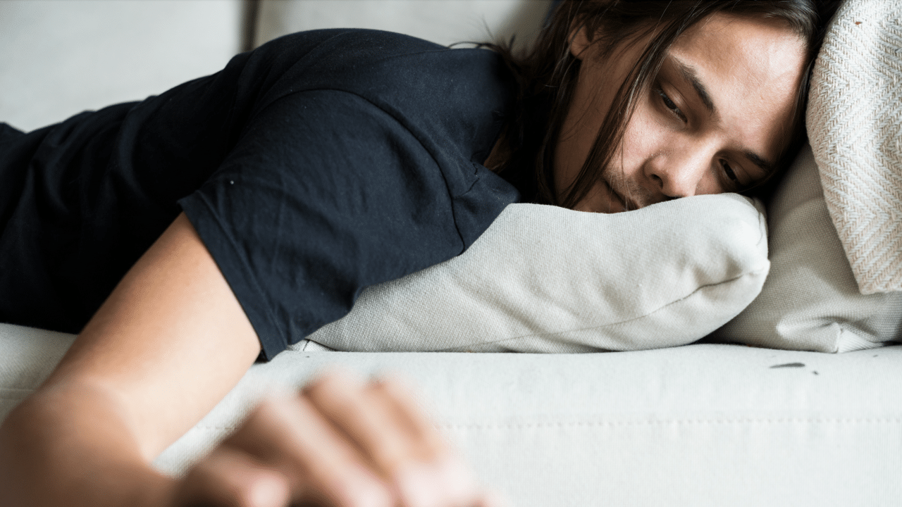 A woman sleeping on the couch