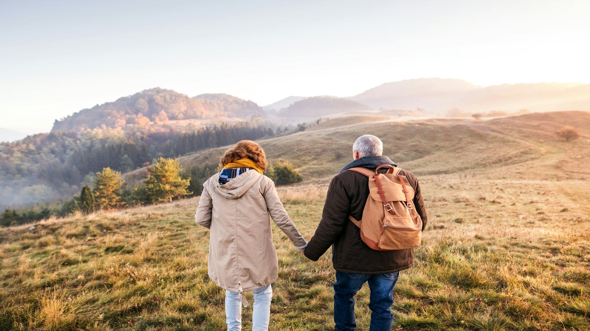 couple watching sunset together