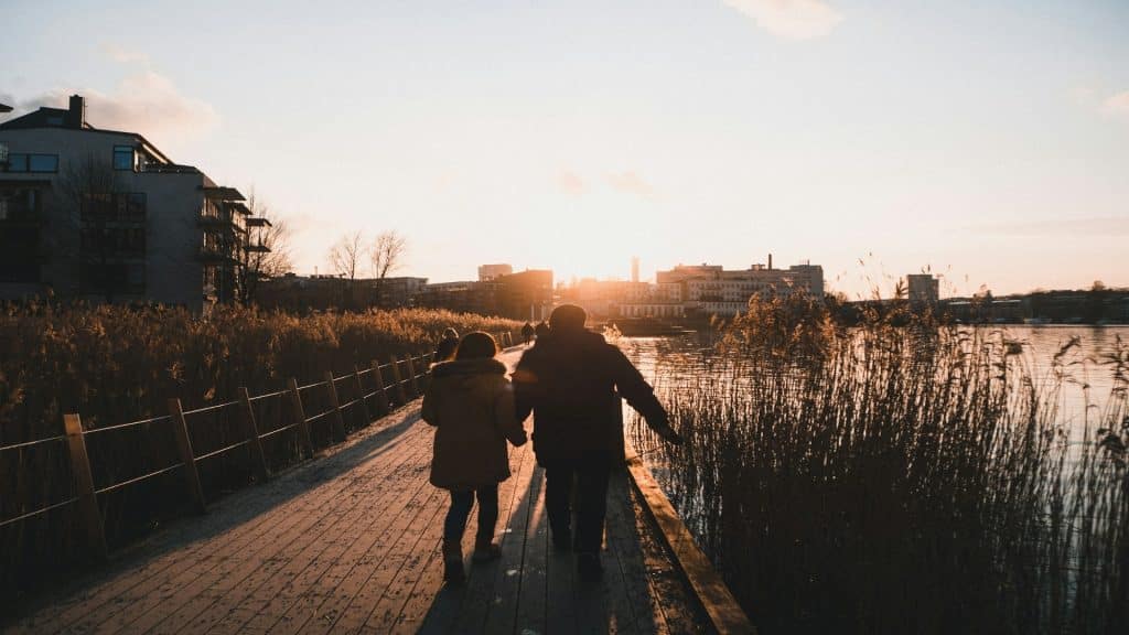 couple walking together at sunset