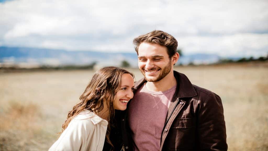 couple smiling warmly