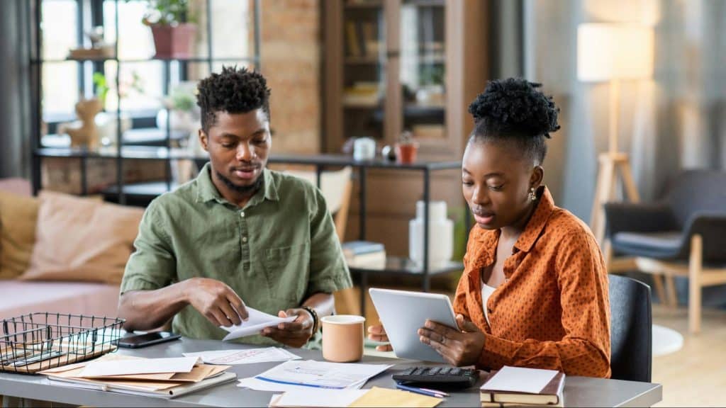 Am man letting woman compute the bills