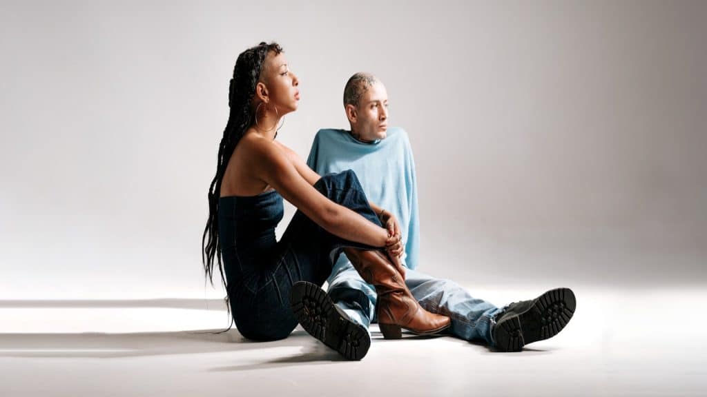 man sitting calmly with partner
