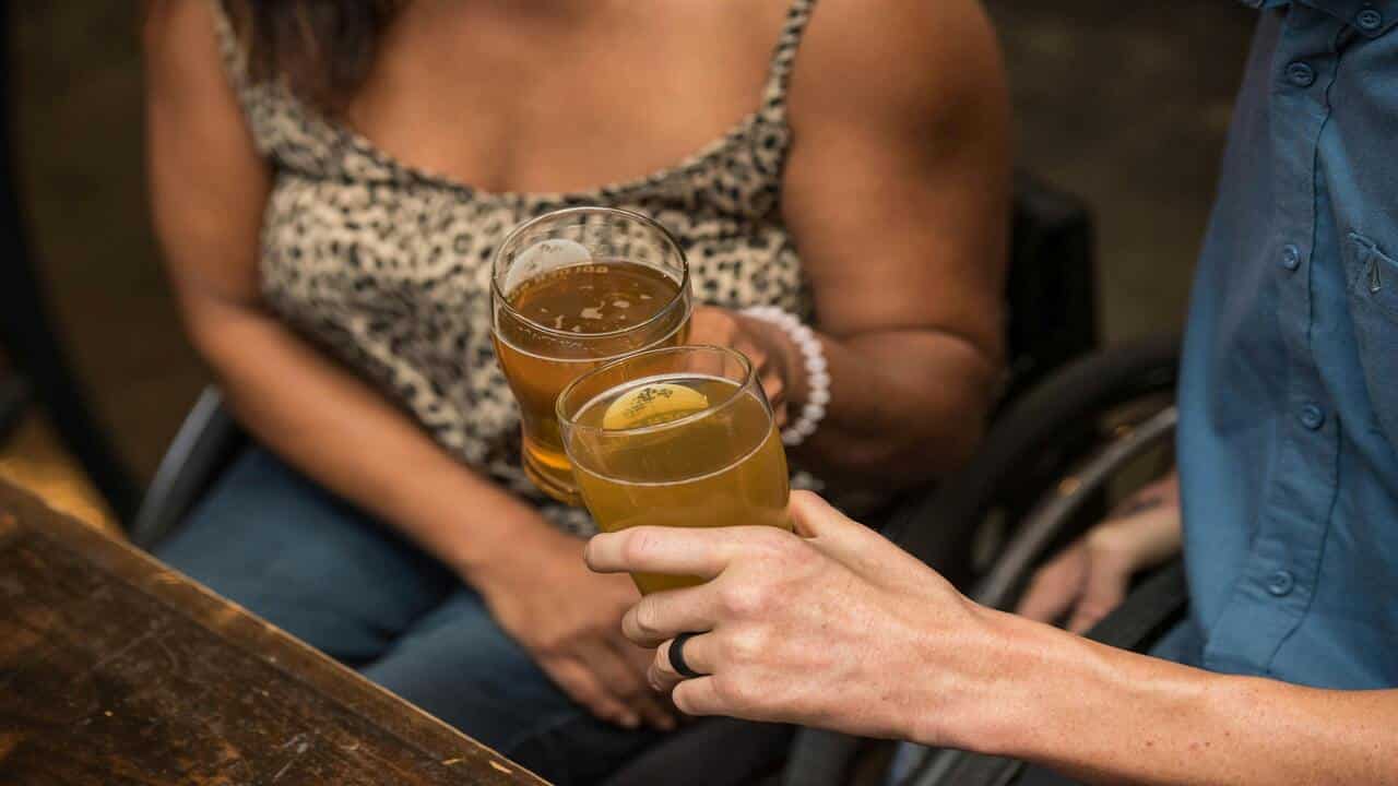 A couple having beer together