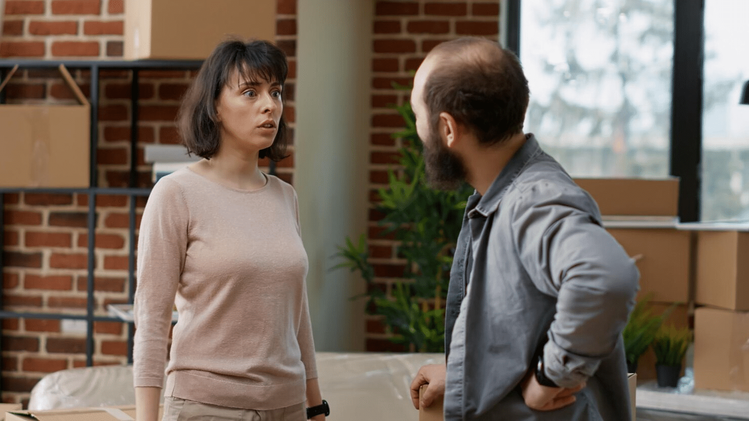 A man and woman arguing