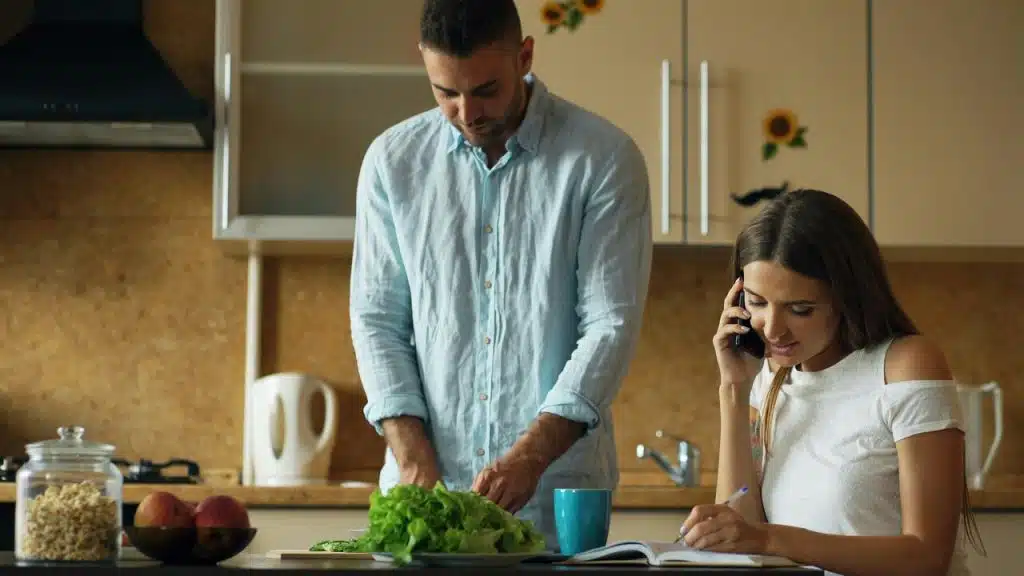 A couple doing the chores together