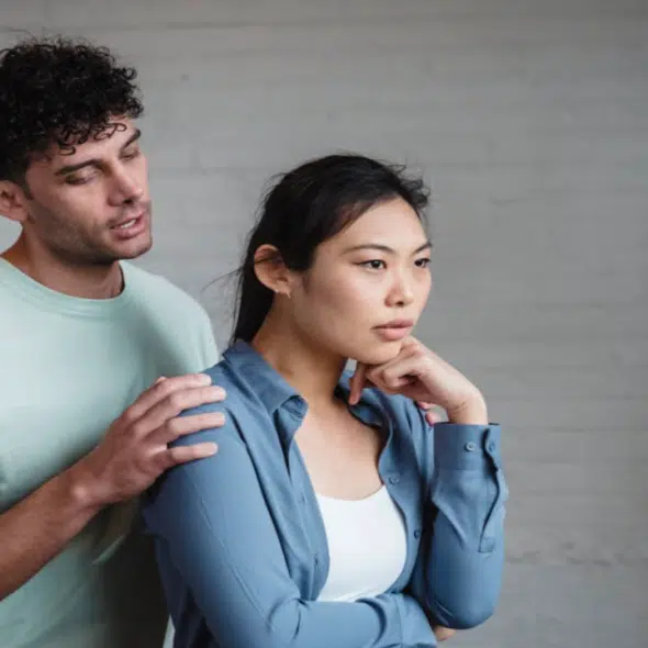 A woman ignoring her husband
