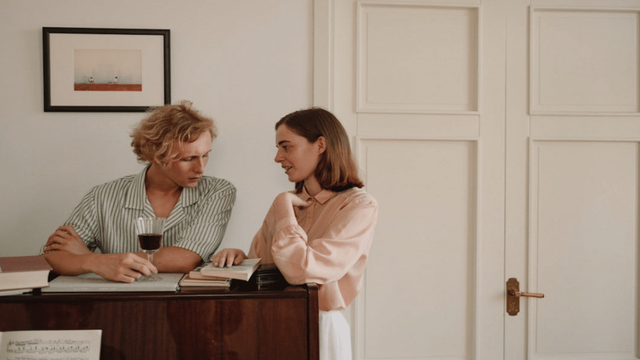A couple talking at home