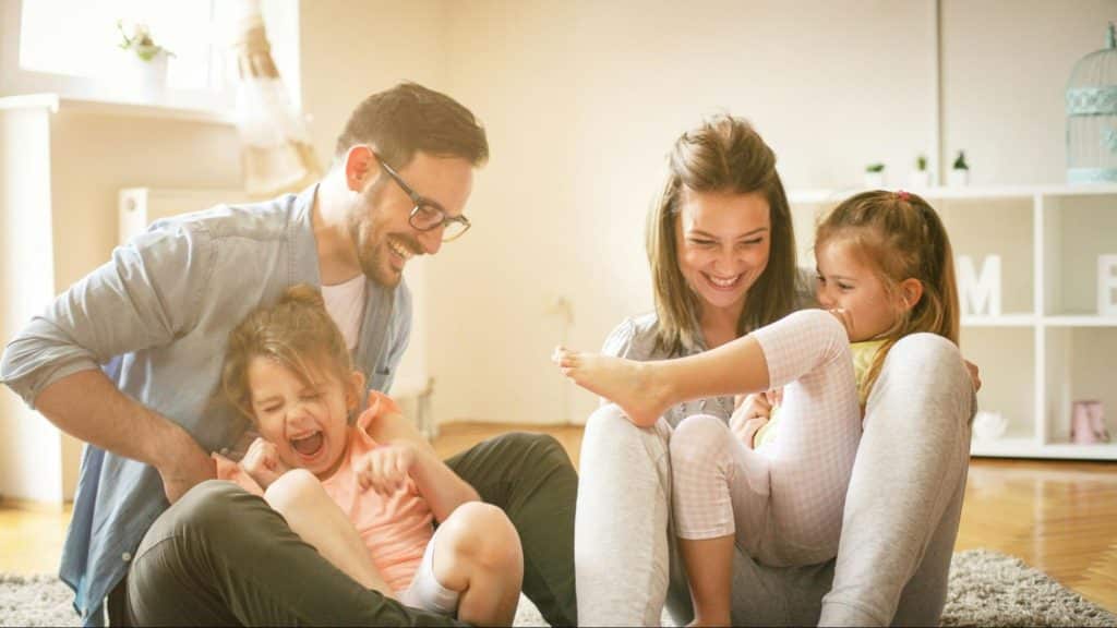 A man and woman together with their children