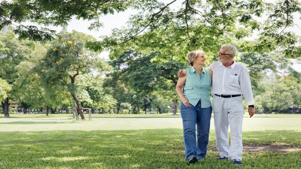 couple walking in park together
