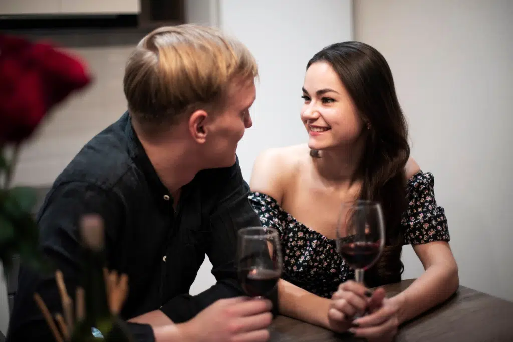 Woman smiling to a man