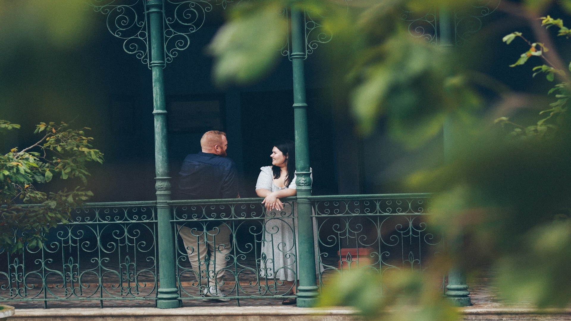 couple having thoughtful discussion outdoors